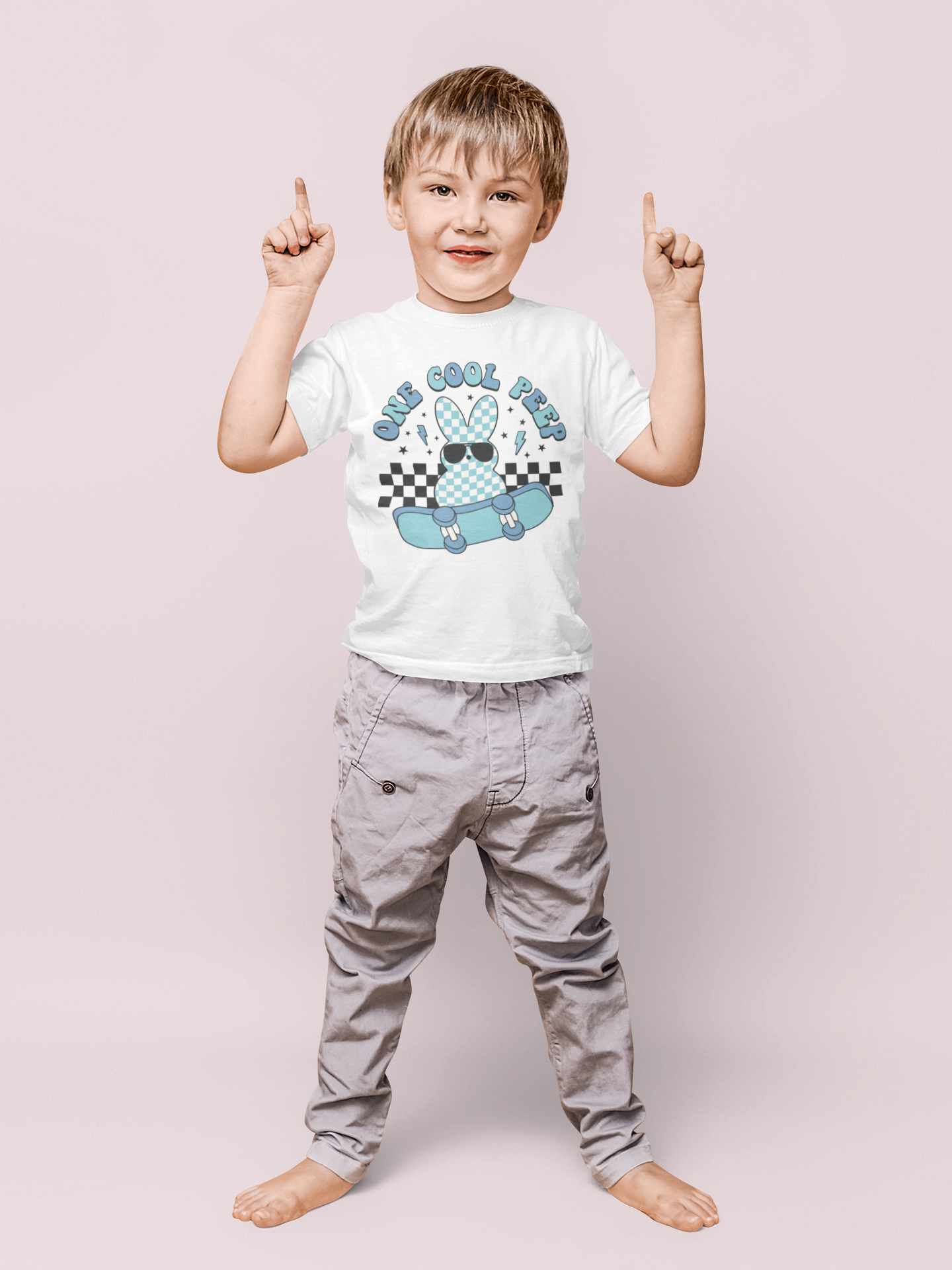 A little boy wearing a "One Cool Peep" T-Shirt 