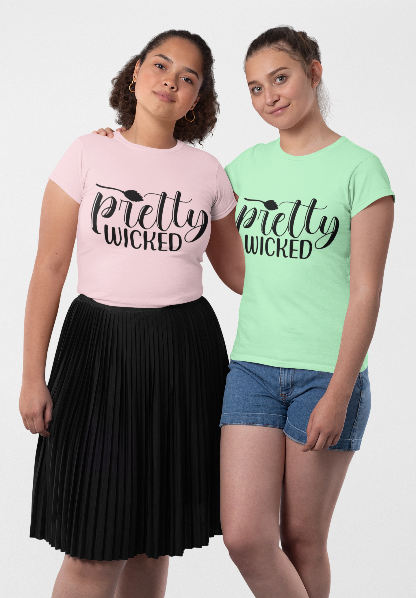 Two girls smiling wearing "Pretty Wicked" T-Shirts